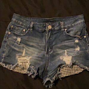 Cheeky frayed jean shorts